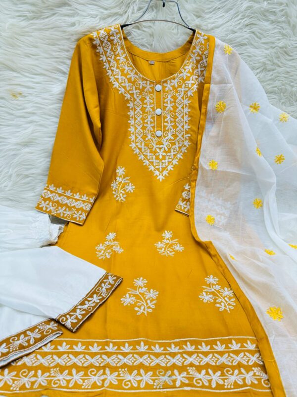 Pakistani Chikankari three-piece set featuring an embroidered top, TC cotton salwar, and lustrous rayon silk dupatta with heavy embroidery and contrasting border